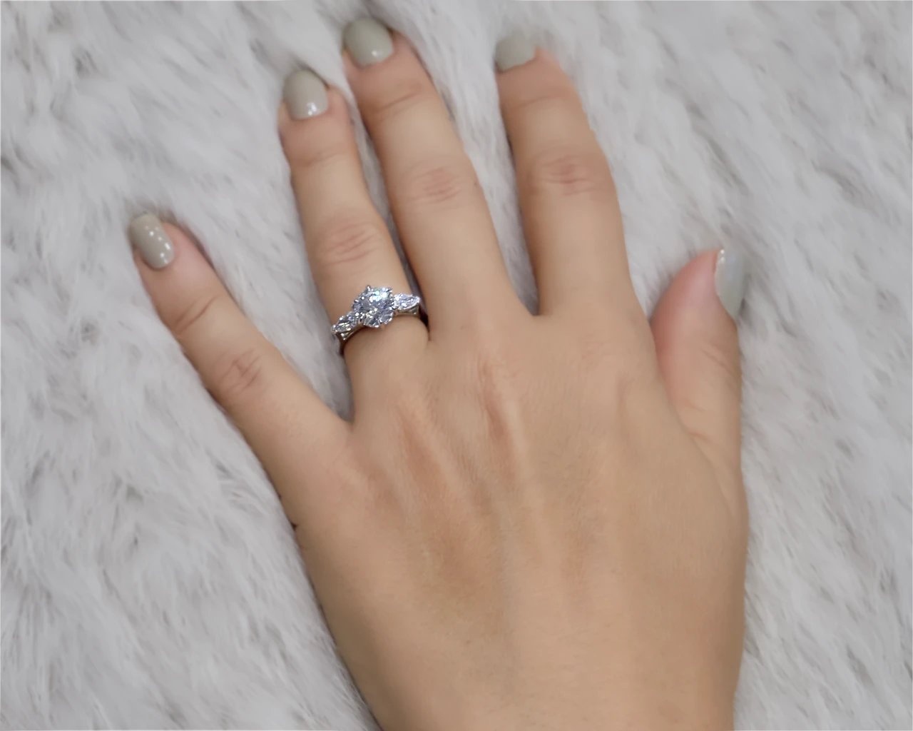Orchid Six Prong Trilogy with Pear Shaped Side Diamonds