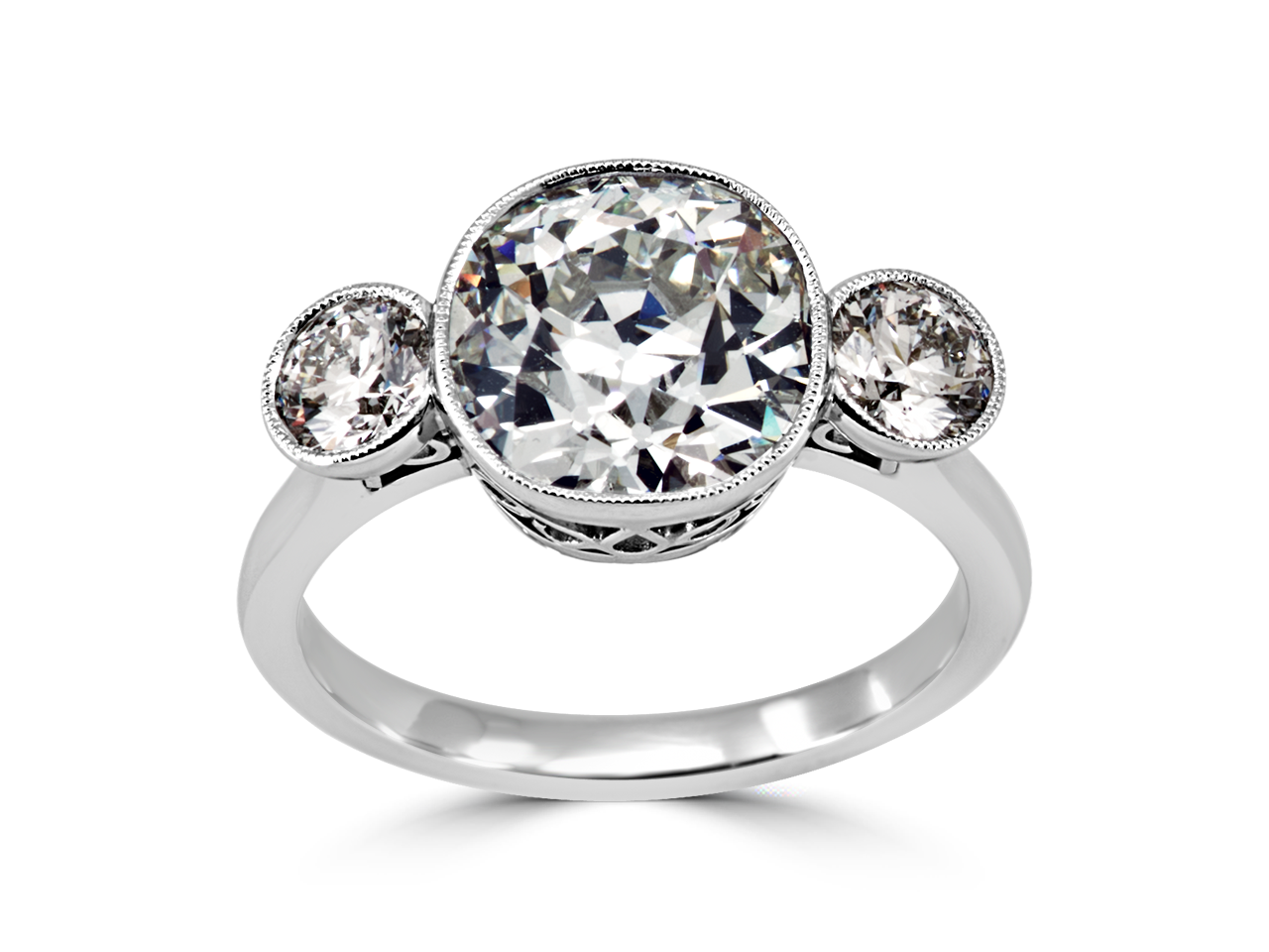 Vintage Bezel Set Old Mine Brilliant and Round Three Stone Ring