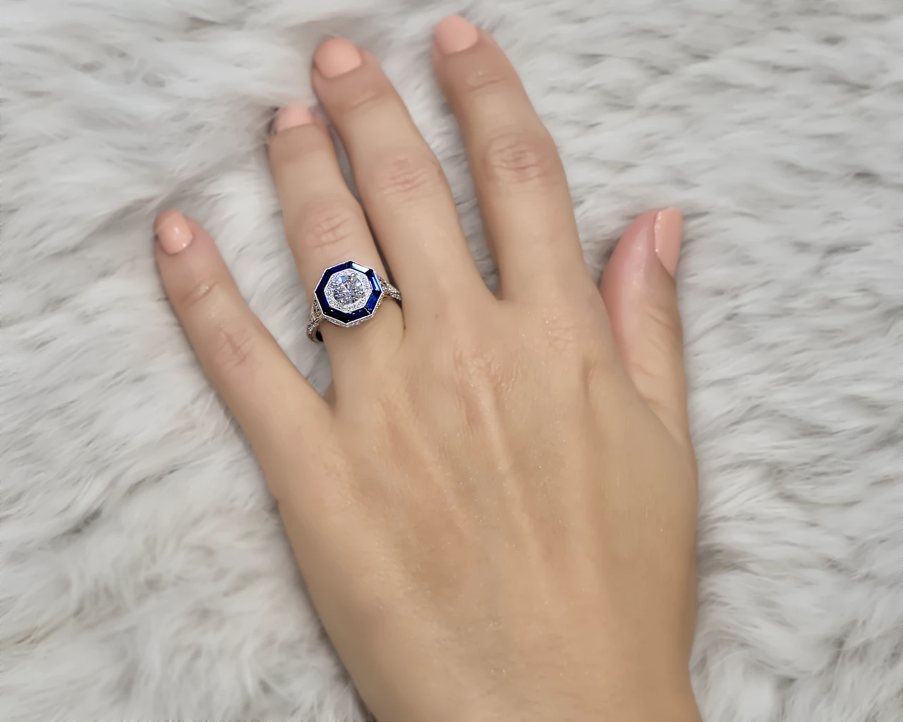 Art Deco Ring Design with an Octagonal Halo and Sapphire Frame